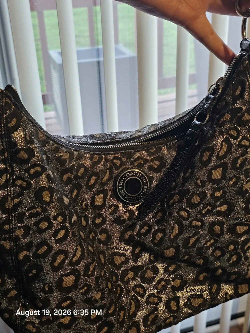 Discontinued Women's Black and Silver COACH Ocelet Hobo Bag F21063